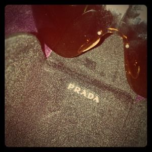 Authentic Prada aviator sunglasses in brown