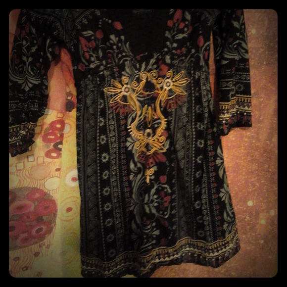 Long shirt/dress with empire banding. Super cute