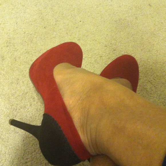 Black and red suede pumps