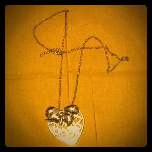Cute golden Bow Heart necklace.