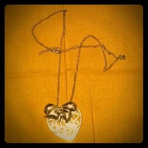 Cute golden Bow Heart necklace.