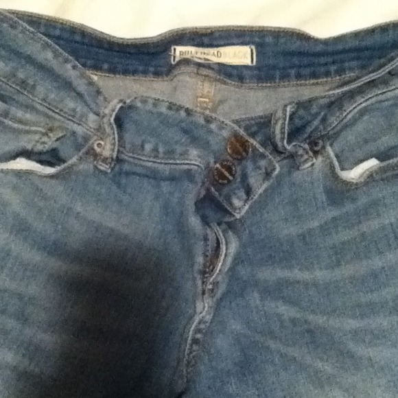 **Traded** light wash jeans and peekaboo tank