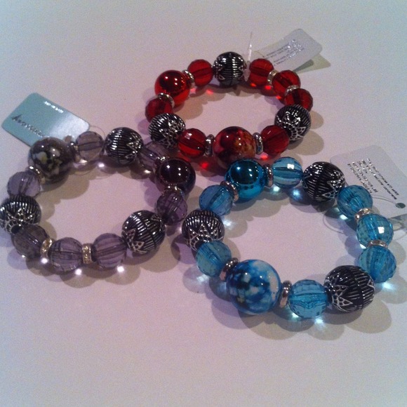 Three elastic beaded bracelets