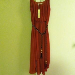 D. Rust dress short front long back
