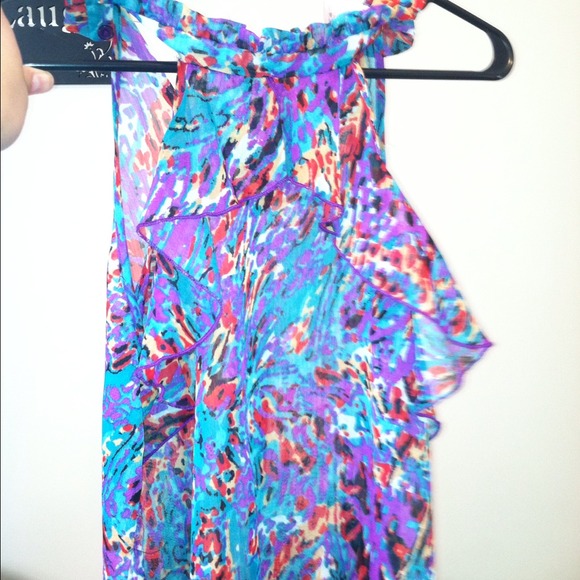 Multi colored tank ;buttons around neck
