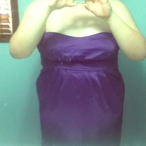 Purple strapless homecoming dress.