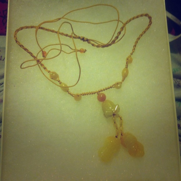 Yellow Jade lucky charm necklace.