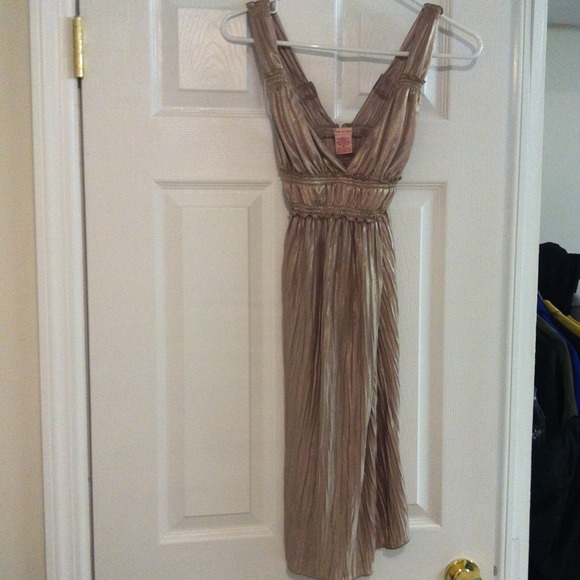 Long knee length gold dress