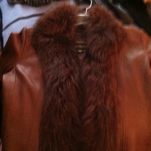 Brown fur trimmed leather jacket.