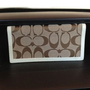 15% off Coach check book pocket