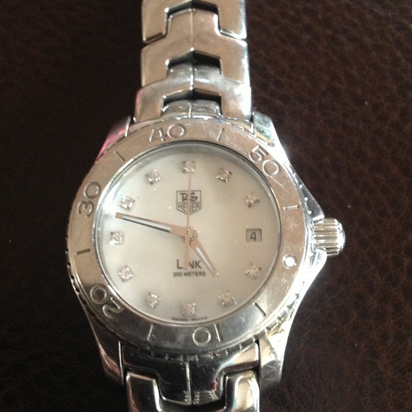 Tag watch with diamonds