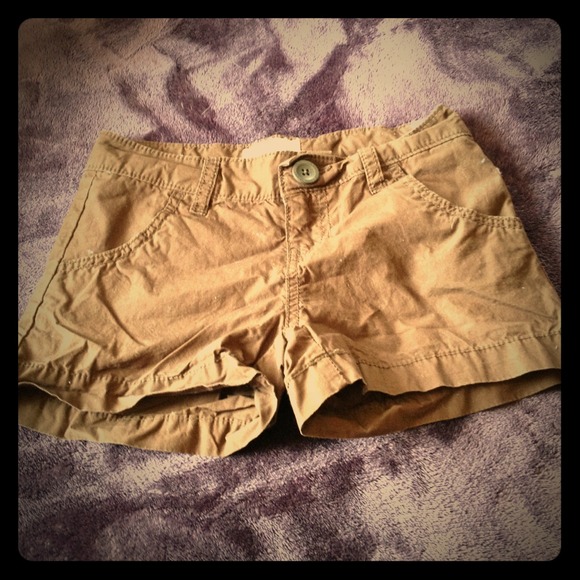 Two pairs of girls shorts. Jean and brown