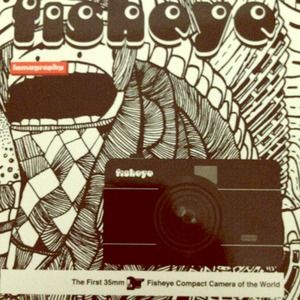 Black compact camera fisheye