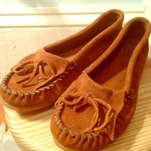 Never worn Minnetonka Moccasins