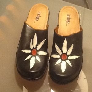Size 7 Indigo Daisy clogs just reduced to $20