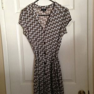 Button down dress with circle pattern.