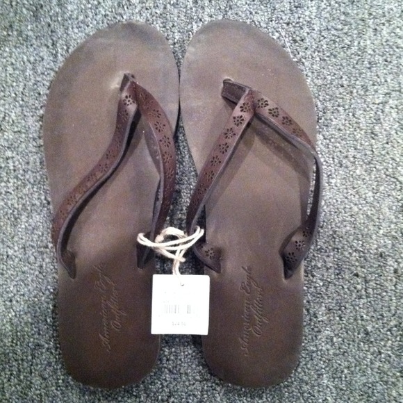 Brown American eagle flip flops