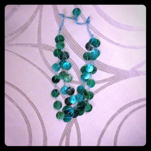 Turquoise beaded necklace.