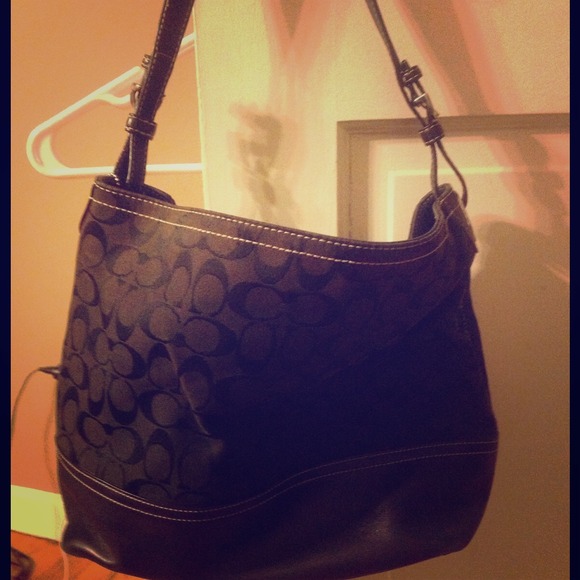 Black coach purse with logo