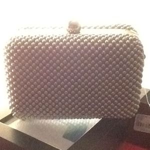 Silver studded clutch with optional strap