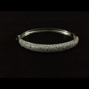 Silver bracelet with CZ stones.