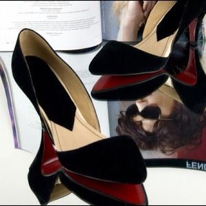 black or white pumps with red bottom