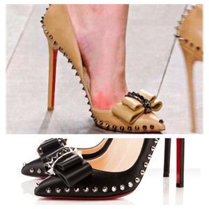 spiked shoes with bow accent pumps