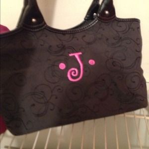 Black medium sized "thirty-one" purse.