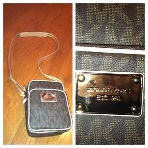 Authentic Michael Kors cross body monogram purse