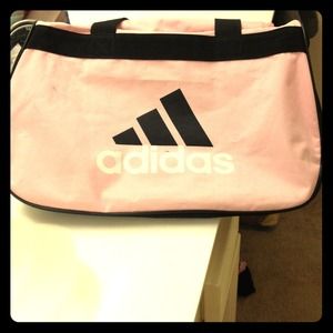 15% off Adidas travel bag. Light pink.