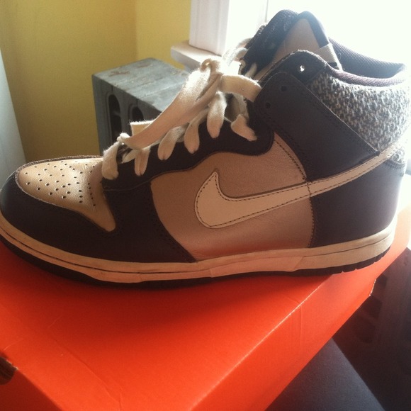 Nike Shoes - RESERVED  dunks!! They are brown practically new!