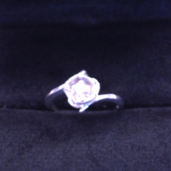Authentic 10k white gold with 1/16c diamond