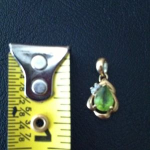 Gold peridot & diamond charm