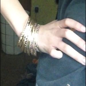 13 Gold bangles!