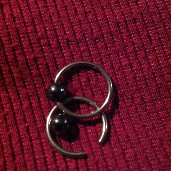 Nipple rings or ear rings