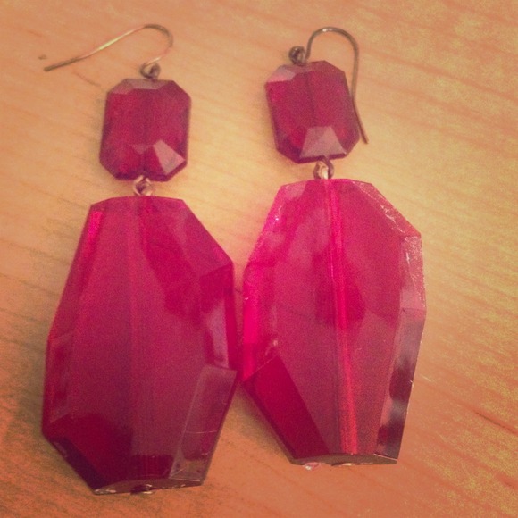 Red geometric earrings.