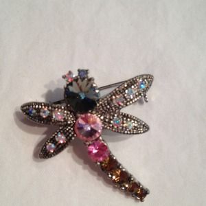 Beautiful butterfly brooch with stones.