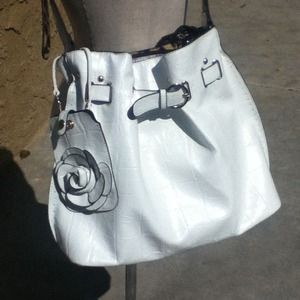 Is anyone going to buy this cute purse?!