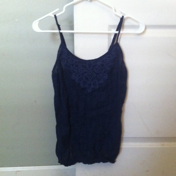 blue tank top.