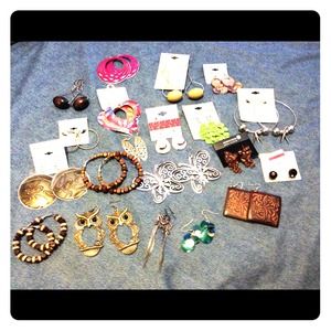A bundle of earrings.   "Sold"