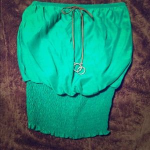 Green tube top with leather detail.