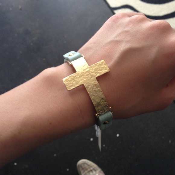 Faux leather and cross bracelet. :)