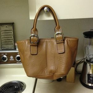 Medium brown leather Tiganello bucket purse