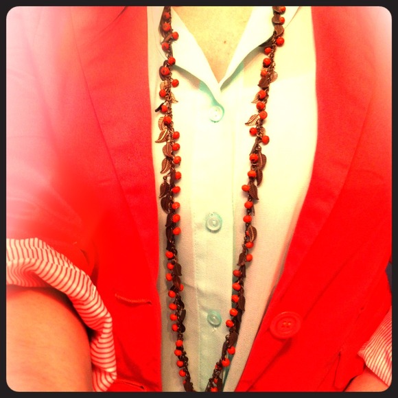 Feather charm necklace