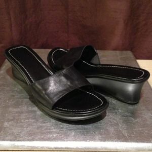 Reserved. Nine West black leather wedge sandal