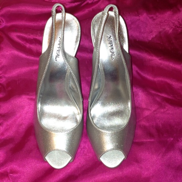 Shiny silver pumps