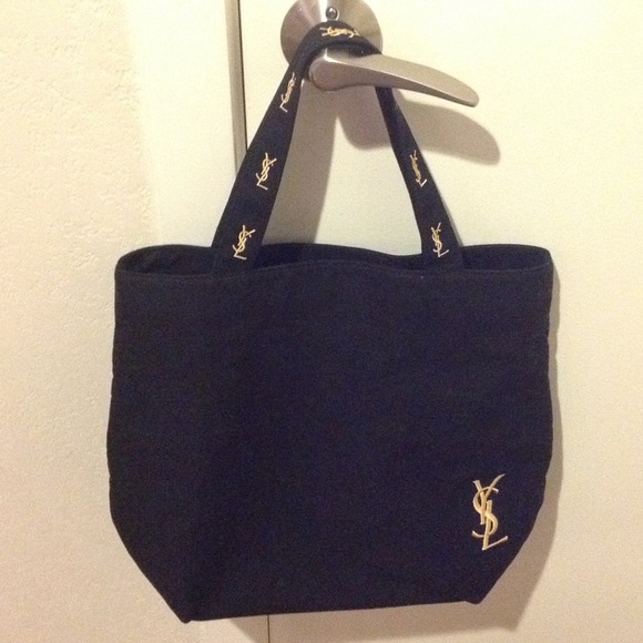 Black canvas YSL tote bag.