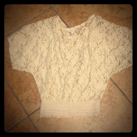 Adorable Cream all lace top with elastic waste.