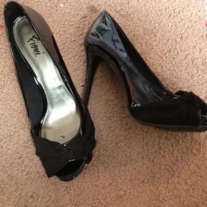 Black heels. Worn only once. Nice shape.