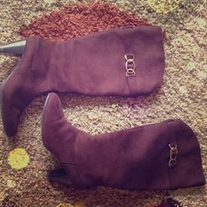 Barely used 'Brown' Boots with gold buckle accent.